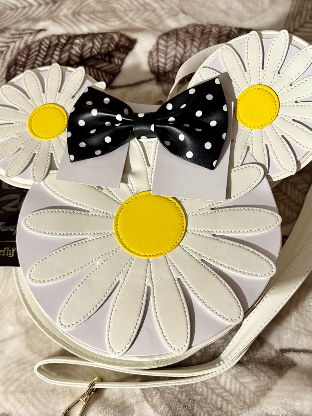 Disney White Daisy Crossbody Bag with Yellow Centers and Black Polka Dot Bow